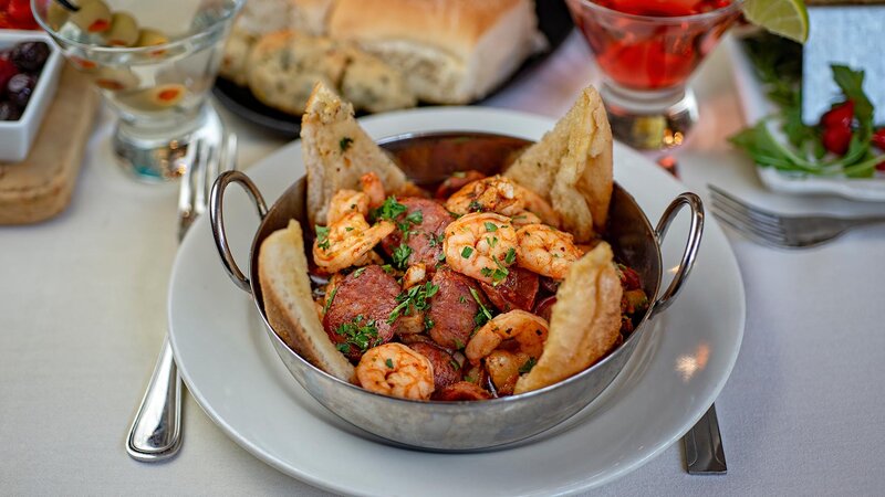 Shrimp and chorizo appetizer with toast bread